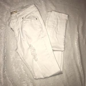 Distressed white jean